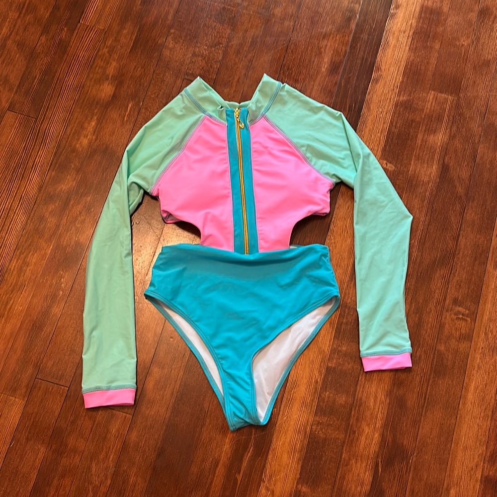 NEW one piece from Attraco sports